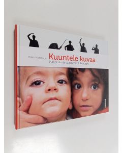 Kirjailijan Mikko Hietaharju käytetty kirja Kuuntele kuvaa : näkökulmia valokuvan tulkintaan