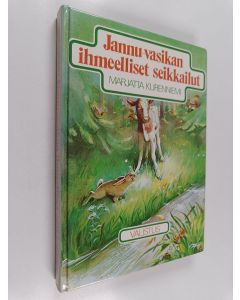 Kirjailijan Marjatta Kurenniemi käytetty kirja Jannu-vasikan ihmeelliset seikkailut : tarina suvisesta metsästä
