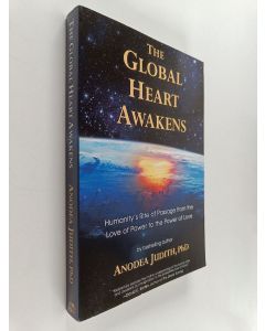 Kirjailijan Anodea Judith käytetty kirja The Global Heart Awakens : Humanity's Rite of Passage from the Love of Power to the Power of Love
