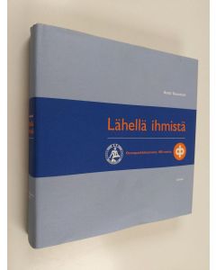 Kirjailijan Antti Kuusterä käytetty kirja Lähellä ihmistä : osuuspankkitoiminta 100 vuotta