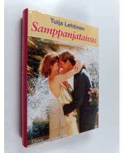 Kirjailijan Tuija Lehtinen käytetty kirja Samppanjataivas : romaani