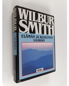 Kirjailijan Wilbur Smith käytetty kirja Elämän ja kuoleman laakso