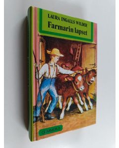 Kirjailijan Laura Ingalls Wilder käytetty kirja Farmarin lapset