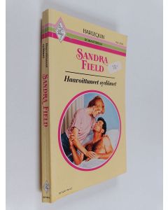Kirjailijan Sandra Field käytetty kirja Haavoittuneet sydämet