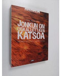 Kirjailijan Tiia Aarnipuu käytetty kirja Jonkun on uskallettava katsoa : Animalian puoli vuosisataa