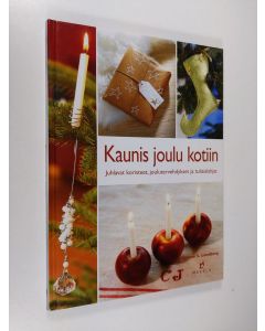 Kirjailijan Helene S. Lundberg käytetty kirja Kaunis joulu kotiin : juhlavat koristeet, joulutervehdykset ja tuliaislahjat