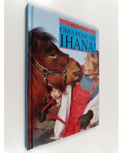 Kirjailijan Elisabeth Feurst käytetty kirja Oma poni on ihana!