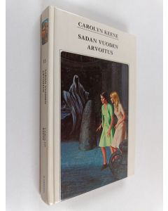 Kirjailijan Carolyn Keene käytetty kirja Sadan vuoden arvoitus