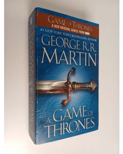 Kirjailijan George R. R. Martin käytetty kirja A game of thrones
