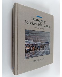 Kirjailijan John E. G. Bateson käytetty kirja Managing services marketing : text and readings