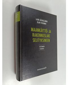 Kirjailijan Lauri Jääskeläinen & Olavi Syrjänen käytetty kirja Maankäyttö- ja rakennuslaki selityksineen : käytännön käsikirja