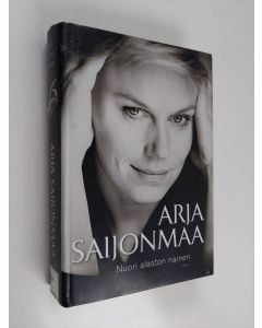 Kirjailijan Arja Saijonmaa käytetty kirja Nuori alaston nainen : Mikis ja minä