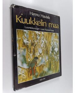 Kirjailijan Hannu Hautala käytetty kirja Kuukkelin maa : luontokuvaajan vuosi Kuusamossa