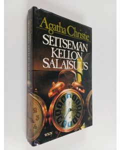 Kirjailijan Agatha Christie käytetty kirja Seitsemän kellon salaisuus