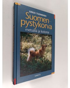 Kirjailijan Erkki Tuominen käytetty kirja Suomenpystykorva metsällä ja kotona