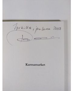 Kirjailijan Timo Heinänen käytetty kirja Karmamarket : runoja (tekijän omiste)