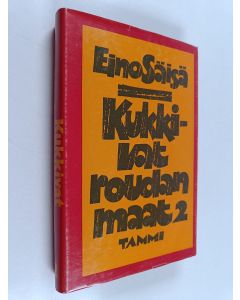 Kirjailijan Eino Säisä käytetty kirja Kukkivat roudan maat 2, Kylä elää