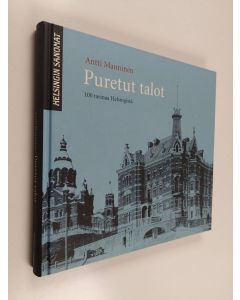 Kirjailijan Antti Manninen käytetty kirja Puretut talot : 100 tarinaa Helsingistä