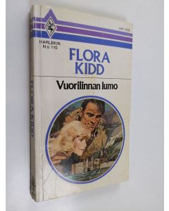 Kirjailijan Flora Kidd käytetty kirja Vuorilinnan lumo