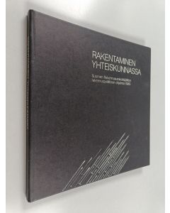 Kirjailijan Juha Salmi käytetty kirja Rakentaminen yhteiskunnassa : Suomen rakennusurakoitsijaliiton rakennuspoliittinen ohjelma 1985