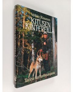 Kirjailijan Veikko Rissanen käytetty kirja Kitusen kintereillä : tarina karhunkaatajasta