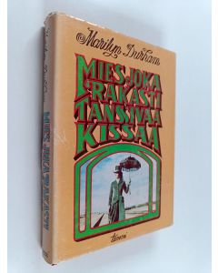 Kirjailijan Marilyn Durham käytetty kirja Mies, joka rakasti Tanssivaa Kissaa