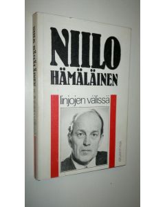 Kirjailijan Niilo Hämäläinen käytetty kirja Linjojen välissä