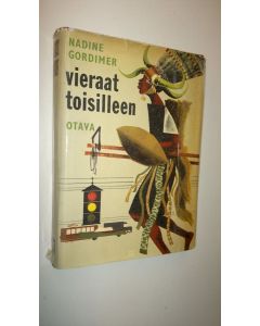 Kirjailijan Nadine Gordimer käytetty kirja Vieraat toisilleen