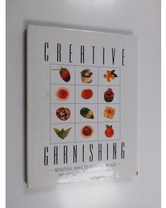 Kirjailijan Mara Reid Rogers käytetty kirja Creative garnishing / : ...beautiful ways to enhance meals