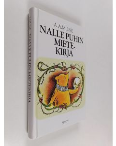Kirjailijan A. A. Milne käytetty kirja Nalle Puhin mietekirja : josta löytyy Nalle Puhin ja hänen ystäviensä lausumia hyödyllisiä tietoja ja voimaa antavia ajatuksia