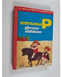 Kirjailijan Lars Nicklasson käytetty kirja Systrarna P gömmer vildhästen