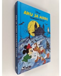 Kirjailijan Walt Disney käytetty kirja Aku ja Mikki taikojen teillä