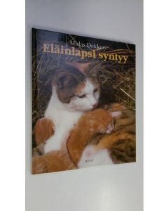 Kirjailijan Midas Dekkers käytetty kirja Eläinlapsi syntyy