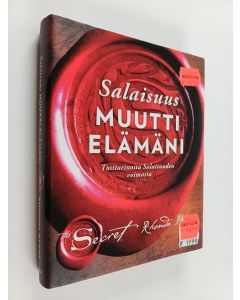 Kirjailijan Rhonda Byrne käytetty kirja Salaisuus muutti elämäni : tositarinoita salaisuuden voimasta