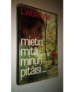 Kirjailijan L. Woiwode käytetty kirja Mietin mitä minun pitäisi