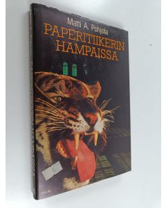 Kirjailijan Matti A. Pohjola käytetty kirja Paperitiikerin hampaissa : journalistinen tutkielma epäammatista ammattina ja siitä, mitä kaikkea sellaisesta voi aiheutua