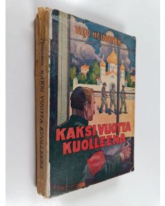Kirjailijan Viljo Heinonen käytetty kirja Kaksi vuotta kuolleena : elettyjä seikkailuja