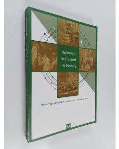 Kirjailijan Päiviö Tommila käytetty kirja Research in finland : a history