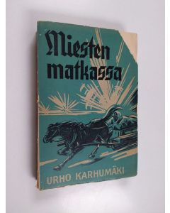 Kirjailijan Urho Karhumäki käytetty kirja Miesten matkassa : romaani talvisodastamme