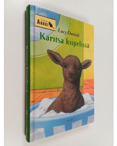 Kirjailijan Lucy Daniels käytetty kirja Karitsa Kiipelissä