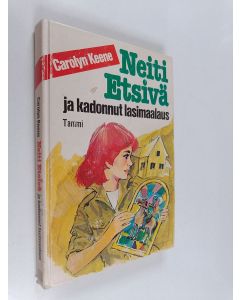 Kirjailijan Carolyn Keene käytetty kirja Neiti Etsivä ja kadonnut lasimaalaus