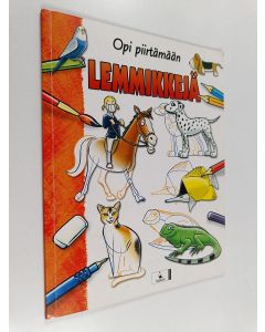 Kirjailijan Damien Toll käytetty teos Opi piirtämään lemmikkejä