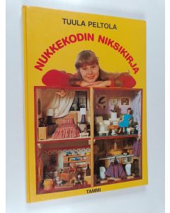 Kirjailijan Tuula Peltola käytetty kirja Nukkekodin niksikirja