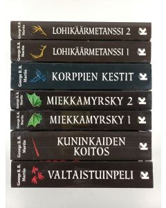 Kirjailijan George R.R. Martin käytetty kirja Tulen ja jään laulu 1-5 (7 kirjaa) : Valtaistuinpeli ; Kuninkaiden koitos ; Miekkamyrsky 1 ; Miekkamyrsky 2 ; Korppien kestit ; Lohikäärmetanssi 1 ; Lohikäärmetanssi 2