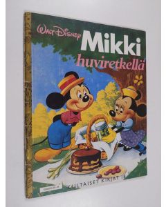 Kirjailijan Walt Disney käytetty teos Mikki huviretkellä