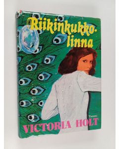 Kirjailijan Victoria Holt käytetty kirja Riikinkukkolinna