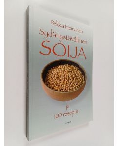 Kirjailijan Pekka Heinänen käytetty kirja Sydänystävällinen soija ja sata reseptiä