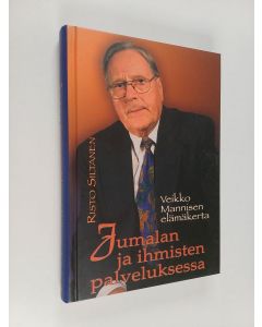 Kirjailijan Veikko Manninen käytetty kirja Jumalan ja ihmisten palveluksessa : Veikko Mannisen elämäkerta