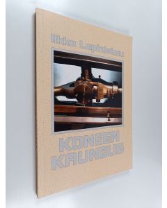 Kirjailijan Ilkka Lapinleimu käytetty kirja Koneen kauneus : valokuva koneen kauneuden ilmaisijana