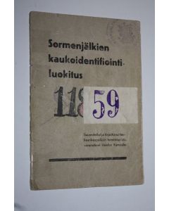 Kirjailijan Veikko Karesalo käytetty teos Sormenjälkien kaukoidentifiointiluokitus